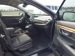 2021 Honda CR-V Touring with VIN 2HKRW1H91MH410751, listed as a IAAI auction lot 41286168 with 56,314 mi miles. Bid and sale history available at carsss.com. Image 5.