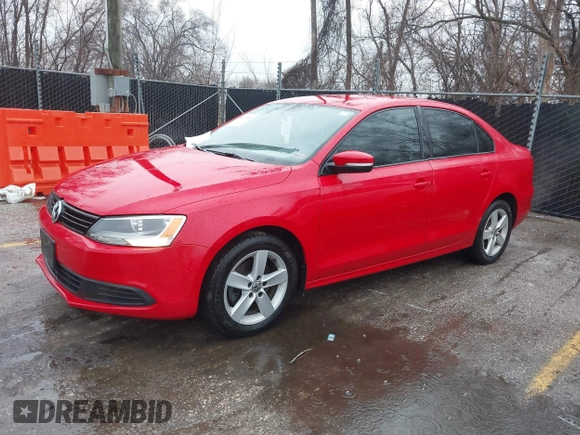 2012 Volkswagen Jetta Sedan TDI with VIN 3VW3L7AJ1CM333438, listed as a IAAI auction lot 41711918 with 105,212 mi miles. Bid and sale history available at carsss.com. Image 2.