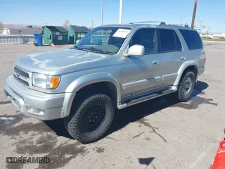 2000 Toyota 4Runner Limited with VIN JT3GN87R6Y0157146, listed as a IAAI auction lot 41696224 with 254,996 mi miles. Bid and sale history available at carsss.com. Image 2.