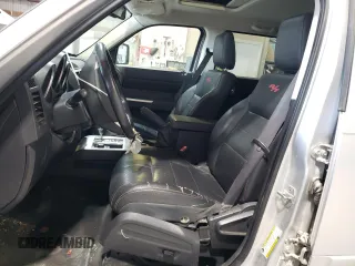2008 Dodge Nitro R/T z VIN 1D8GU58618W151545, wystawiony jako Copart lot #75465574 z przebiegiem Nie podano mil oraz Szkoda całkowita • Salvage title. Historia ofert i sprzedaży dostępna na DreamBid. Obrazek 7.