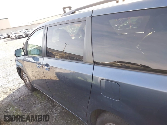 2016 Toyota Sienna XLE with VIN 5TDYK3DC8GS720852, listed as a IAAI auction lot 41341268 with 119,927 mi miles. Bid and sale history available at carsss.com. Image 15.