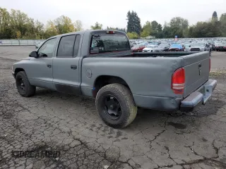 2003 Dodge Dakota Sport with VIN 1D7HL38N63S192308, listed as a Copart auction lot 77494684 with 128,512 mi miles and Salvage Title. Bid and sale history available at carsss.com. Image 2.