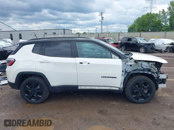 2021 Jeep Compass Altitude with VIN 3C4NJDBBXMT586529, listed as a IAAI auction lot 42296016 with 71,789 mi miles and . Bid and sale history available at DreamBid. Image 14.