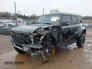 2023 Ford Bronco Raptor with VIN 1FMEE5JR2PLB77882, listed as a IAAI auction lot 41386503 with 19,318 mi miles. Bid and sale history available at carsss.com. Image 2.