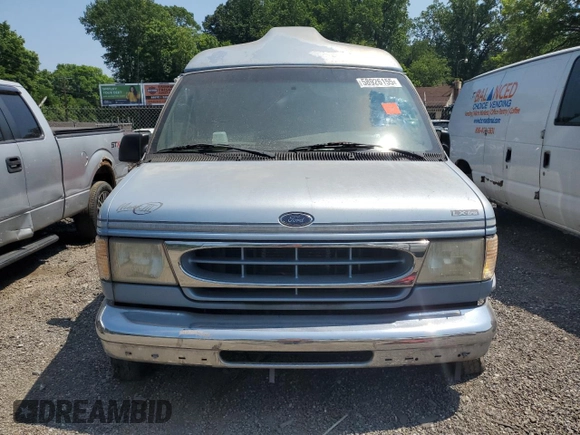 2000 Ford Econoline Cargo Recreational with VIN 1FDRE14L5YHA56690, listed as a Copart auction lot 58926155 with 162,797 mi miles and Salvage title. Bid and sale history available at DreamBid. Image 5.