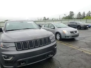 2016 Jeep Grand Cherokee Limited 75th Anniversary with VIN 1C4RJFBGXGC482082, listed as a Copart auction lot 56217165 with 80,787 mi miles and Salvage Title. Bid and sale history available at DreamBid. Image 15.
