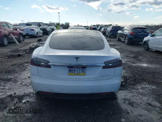 2021 Tesla Model S Long Range Plus with VIN 5YJSA1E20MF426400, listed as a IAAI auction lot 41453704 with Not provided miles and . Bid and sale history available at DreamBid. Image 15.