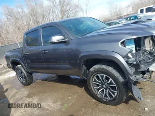 2021 Toyota Tacoma SR z VIN 3TMCZ5AN0MM392247, wystawiony jako IAAI lot #41645989 z przebiegiem 48 029 mil mil oraz . Historia ofert i sprzedaży dostępna na DreamBid. Obrazek 14.