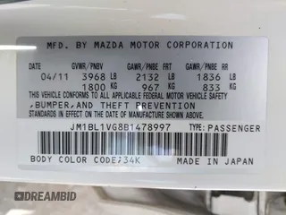2011 Mazda 3 i Touring with VIN JM1BL1VG8B1478997, listed as a IAAI auction lot 41945998 with 111,784 mi miles and . Bid and sale history available at DreamBid. Image 9.