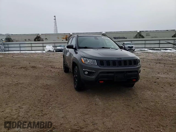 2020 Jeep Compass Trailhawk with VIN 3C4NJDDB0LT215553, listed as a Copart auction lot 45045165 with 90,702 mi miles and Salvage Title. Bid and sale history available at carsss.com. Image 12.