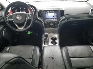 2017 Jeep Grand Cherokee Summit with VIN 1C4RJFJT1HC818136, listed as a Copart auction lot 81057084 with 135,843 mi miles and Salvage title. Bid and sale history available at DreamBid. Image 8.