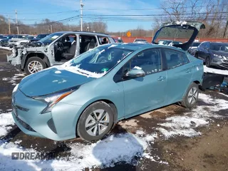 2018 Toyota Prius Two with VIN JTDKARFU5J3066998, listed as a IAAI auction lot 41405382 with 92,377 mi miles. Bid and sale history available at carsss.com. Image 2.