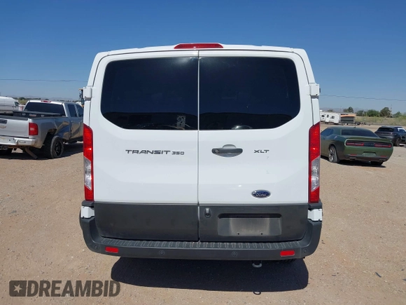 2023 Ford Transit Passenger XL with VIN 1FBAX2Y89PKA45043, listed as a IAAI auction lot 39253709 with 54,625 mi miles and . Bid and sale history available at DreamBid. Image 16.