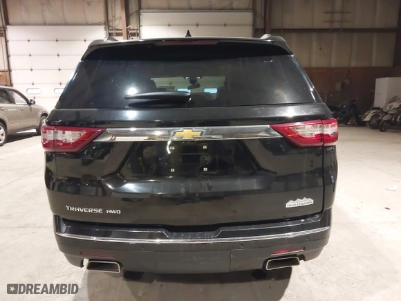 2021 Chevrolet Traverse High Country with VIN 1GNEVNKW9MJ150993, listed as a IAAI auction lot 41224329 with 100,425 mi miles. Bid and sale history available at carsss.com. Image 17.