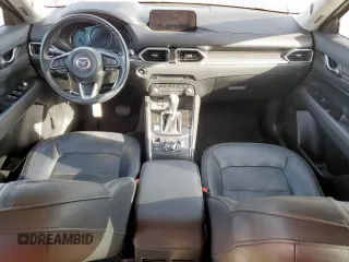 2019 Mazda CX-5 Grand Touring with VIN JM3KFADM8K1634011, listed as a Copart auction lot 57343455 with 67,138 mi miles and Salvage title. Bid and sale history available at DreamBid. Image 8.