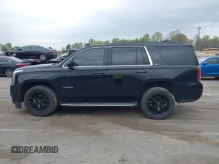 2017 GMC Yukon SLT with VIN 1GKS1BKC2HR128308, listed as a IAAI auction lot 41945770 with 158,905 mi miles. Bid and sale history available at carsss.com. Image 14.