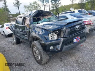 2014 Toyota Tacoma PreRunner with VIN 5TFJU4GN8EX057773, listed as a IAAI auction lot 42020511 with 228,730 mi miles and . Bid and sale history available at DreamBid. Image 1.