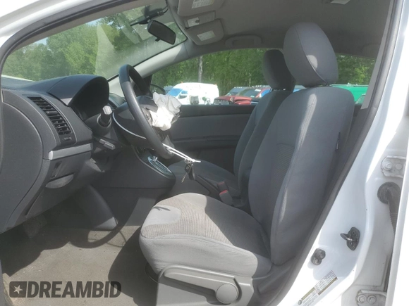 2010 Nissan Sentra S with VIN 3N1AB6AP1AL661282, listed as a Copart auction lot 56645605 with 128,504 mi miles and Salvage title. Bid and sale history available at DreamBid. Image 7.