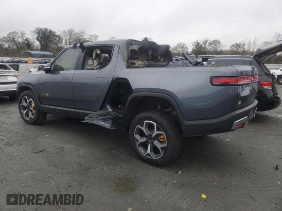 2022 Rivian R1T Adventure z VIN 7FCTGAAA5NN014020, wystawiony jako Copart lot #81367764 z przebiegiem Nie podano mil oraz Szkody całkowita. Historia ofert i sprzedaży dostępna na DreamBid. Obrazek 2.