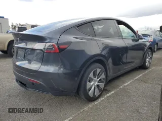 2024 Tesla Model Y with VIN 7SAYGDED1RF052031, listed as a Copart auction lot 48507865 with 5,365 mi miles and Salvage title. Bid and sale history available at DreamBid. Image 3.