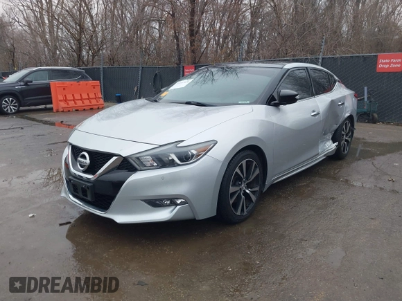2018 Nissan Maxima SL z VIN 1N4AA6AP1JC394078, wystawiony jako IAAI lot #41197428 z przebiegiem 91 281 mil mil oraz . Historia ofert i sprzedaży dostępna na DreamBid. Obrazek 17.