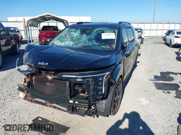 2025 Kia Carnival SX with VIN KNDNE5K35S6472142, listed as a IAAI auction lot 41280650 with 4,181 mi miles and . Bid and sale history available at DreamBid. Image 6.