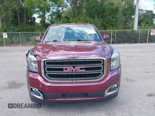 2020 GMC Yukon SLT z VIN 1GKS1BKC4LR242383, wystawiony jako IAAI lot #42104912 z przebiegiem 55 017 mil mil oraz . Historia ofert i sprzedaży dostępna na DreamBid. Obrazek 12.