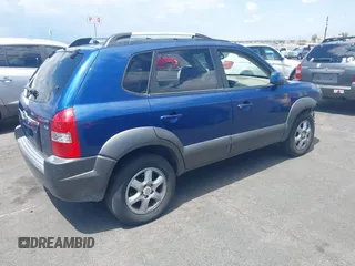 2005 Hyundai Tucson GLS with VIN KM8JN12D45U132721, listed as a IAAI auction lot 42213518 with 153,491 mi miles. Bid and sale history available at carsss.com. Image 4.