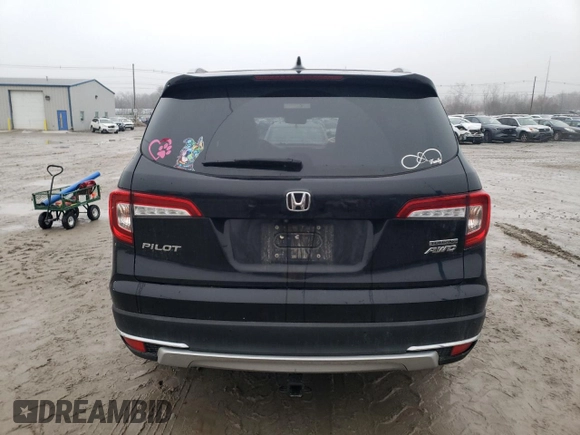 2020 Honda Pilot Touring 7-Passenger z VIN 5FNYF6H67LB003593, wystawiony jako Copart lot #83658334 z przebiegiem 105 575 mil mil oraz Szkoda całkowita • Salvage title. Historia ofert i sprzedaży dostępna na DreamBid. Obrazek 6.