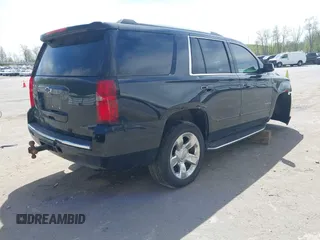 2015 Chevrolet Tahoe LTZ with VIN 1GNSKCKC8FR514671, listed as a IAAI auction lot 42157084 with 182,665 mi miles and . Bid and sale history available at DreamBid. Image 4.