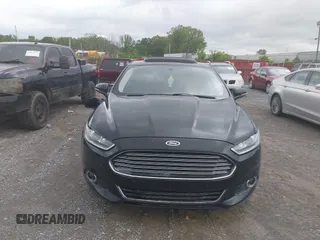 2016 Ford Fusion Titanium with VIN 3FA6P0K97GR118922, listed as a IAAI auction lot 42121212 with 256,584 mi miles and . Bid and sale history available at DreamBid. Image 6.