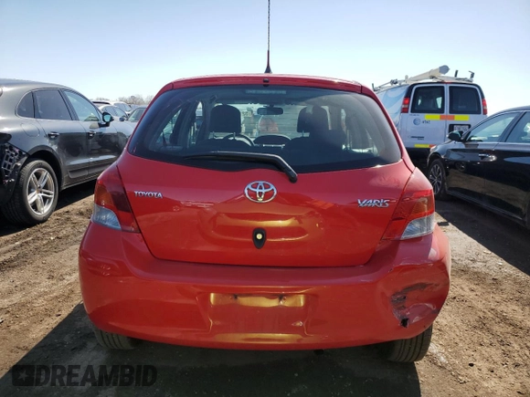 2009 Toyota Yaris with VIN JTDKT903095246576, listed as a Copart auction lot 52150915 with 90,276 mi miles and Salvage Title. Bid and sale history available at DreamBid. Image 6.