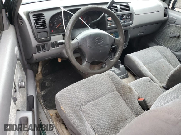 2000 Nissan Frontier XE with VIN 1N6DD26SXYC400648, listed as a Copart auction lot 58756855 with 148,051 mi miles and Salvage title. Bid and sale history available at DreamBid. Image 8.
