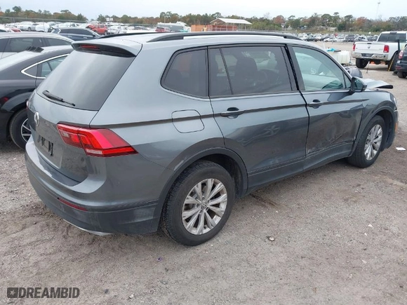 2019 Volkswagen Tiguan S with VIN 3VV1B7AX3KM047494, listed as a IAAI auction lot 41355084 with 90,612 mi miles. Bid and sale history available at carsss.com. Image 4.