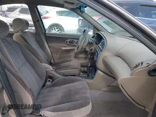 1996 Ford Contour LX с VIN 1FALP6530TK105053, выставлен на аукционе IAAI как лот 41287231 с пробегом 115 177 миль миль и . История ставок и продаж доступна на DreamBid. Изображение 5.