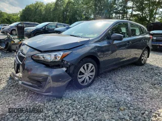 2019 Subaru Impreza with VIN 4S3GTAA64K3736388, listed as a Copart auction lot 62708005 with 66,671 mi miles and Salvage title. Bid and sale history available at DreamBid. Image 1.