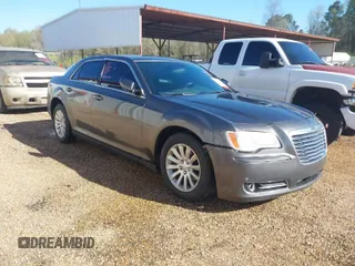 2014 Chrysler 300 with VIN 2C3CCAAG2EH327934, listed as a IAAI auction lot 41875056 with 241,599 mi miles. Bid and sale history available at carsss.com. Image 1.