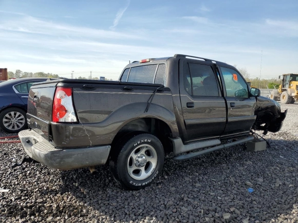 2005 Ford Explorer Sport Trac XLS z VIN 1FMZU67K65UA70362, wystawiony jako Copart lot #50586995 z przebiegiem 207 077 mil mil oraz Szkoda całkowita • Salvage title. Historia ofert i sprzedaży dostępna na DreamBid. Obrazek 3.