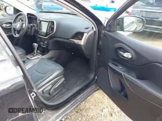 2014 Jeep Cherokee Limited with VIN 1C4PJMDS3EW211129, listed as a IAAI auction lot 41877310 with 91,791 mi miles and . Bid and sale history available at DreamBid. Image 5.