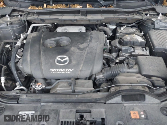 2016 Mazda CX-5 Touring with VIN JM3KE2CY2G0808424, listed as a IAAI auction lot 41880494 with 149,005 mi miles. Bid and sale history available at carsss.com. Image 10.