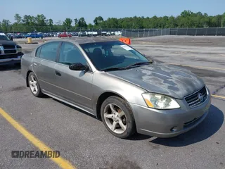 2005 Nissan Altima SE z VIN 1N4BL11D95N437079, wystawiony jako IAAI lot #42399612 z przebiegiem 296 135 mil mil oraz . Historia ofert i sprzedaży dostępna na DreamBid. Obrazek 1.