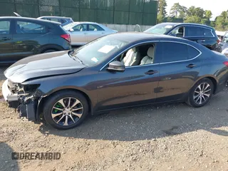 2015 Acura TLX with VIN 19UUB1F31FA023293, listed as a IAAI auction lot 40310652 with 117,350 mi miles. Bid and sale history available at carsss.com. Image 14.