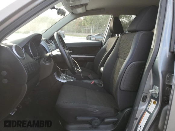 2009 Suzuki Grand Vitara with VIN JS3TD042694100821, listed as a Copart auction lot 57209065 with 89,362 mi miles and Salvage title. Bid and sale history available at DreamBid. Image 7.