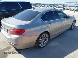 2015 BMW 5 Series 535i with VIN WBA5B1C56FG125286, listed as a IAAI auction lot 41747088 with 136,970 mi miles and . Bid and sale history available at carsss.com. Image 4.
