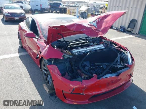 2022 Tesla Model S Plaid with VIN 5YJSA1E61NF460253, listed as a IAAI auction lot 40328727 with Not provided miles and . Bid and sale history available at DreamBid. Image 6.