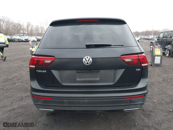 2018 Volkswagen Tiguan S with VIN 3VV1B7AX9JM091210, listed as a IAAI auction lot 41683380 with 63,627 mi miles. Bid and sale history available at carsss.com. Image 16.