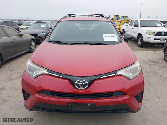 2016 Toyota RAV4 LE with VIN JTMZFREV4GJ063704, listed as a IAAI auction lot 41497086 with 153,748 mi miles. Bid and sale history available at carsss.com. Image 12.