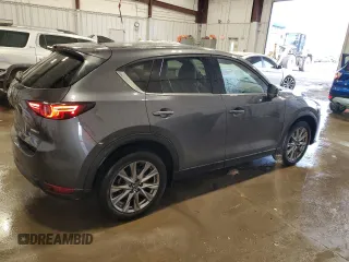 2021 Mazda CX-5 Grand Touring with VIN JM3KFBDM6M0478372, listed as a Copart auction lot 43797295 with 31,763 mi miles and Salvage Title. Bid and sale history available at carsss.com. Image 3.
