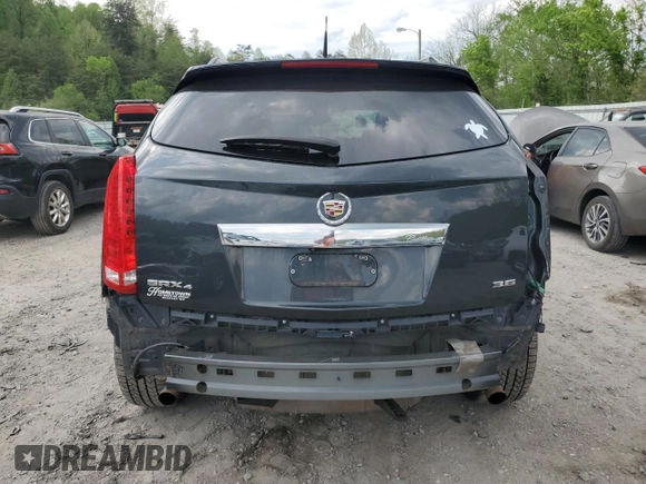 2014 Cadillac SRX Premium Collection with VIN 3GYFNGE3XES560903, listed as a Copart auction lot 52529525 with 117,780 mi miles and Salvage title. Bid and sale history available at DreamBid. Image 6.
