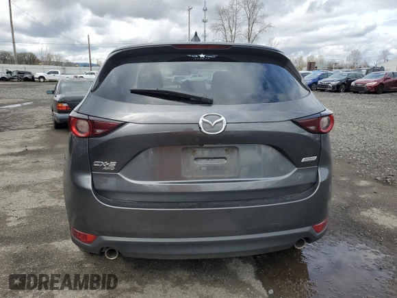2018 Mazda CX-5 Touring with VIN JM3KFBCM1J0372702, listed as a Copart auction lot 49714595 with 107,805 mi miles and Salvage Title. Bid and sale history available at carsss.com. Image 6.
